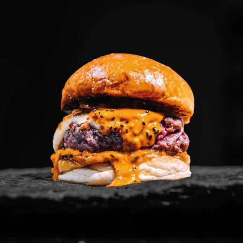 Salsa Emmy y mermelada de bacon juntas en The Champions Burger.